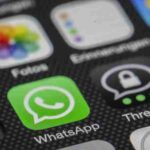 Detailed macro of smartphone screen showcasing popular app icons like WhatsApp., tags: und - pexel
